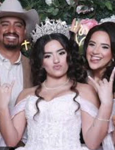 Photo Booth Rental for Quinceañera:Group of family members using props in a photo booth at a quinceañera